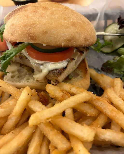 Door County Whitefish or Mahi Mahi sandwich and fries available at Dovetail Bar Grill restaurant with American pub style food and full bar near Sister Bay Door County WI
